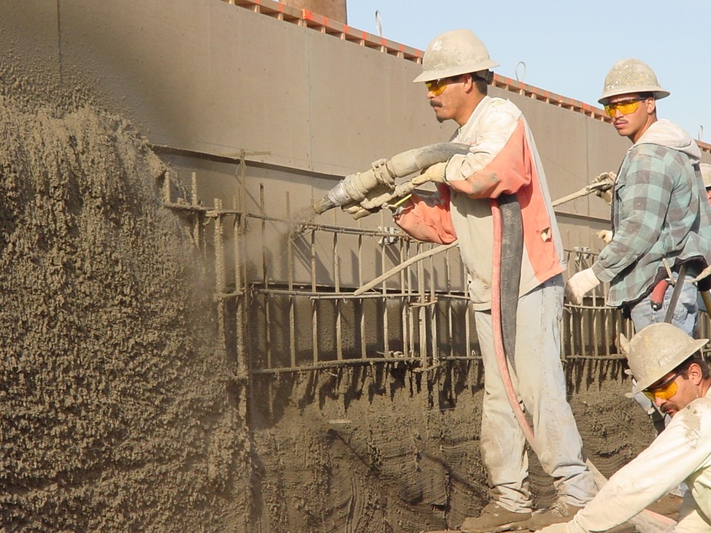 Eco-friendly shotcrete application in construction, highlighting its role in reducing carbon footprint and supporting sustainable building practices.