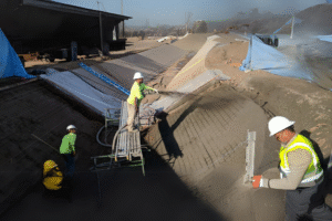 Comparing wet mix and dry mix shotcrete application techniques for underground infrastructure maintenance, ensuring superior strength and durability